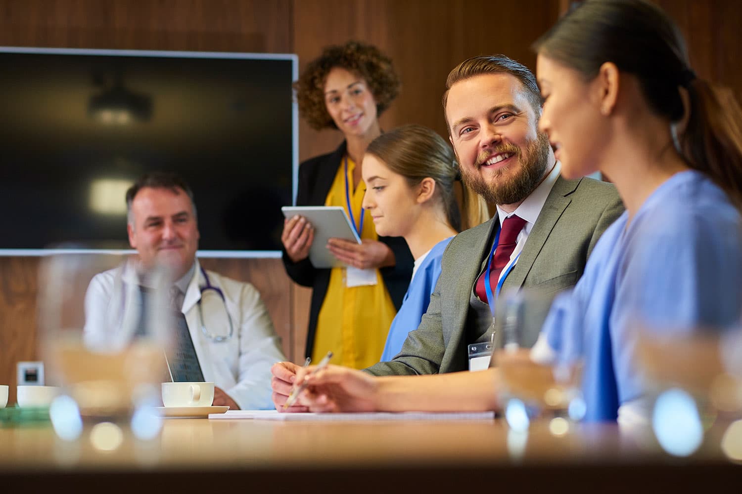 Group of medical professionals learning in class