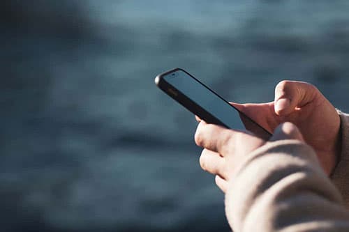 Holding mobile phone