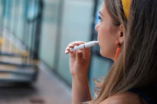 Teen girl vaping